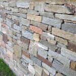 parete muro a secco in pietra naturale masselli blocchi grezzi binderi prezzo
