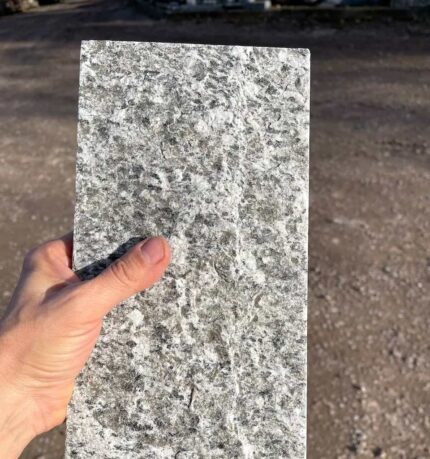 Serizzo Sempione split-face stone wall cladding, 15 cm X 31 cm.